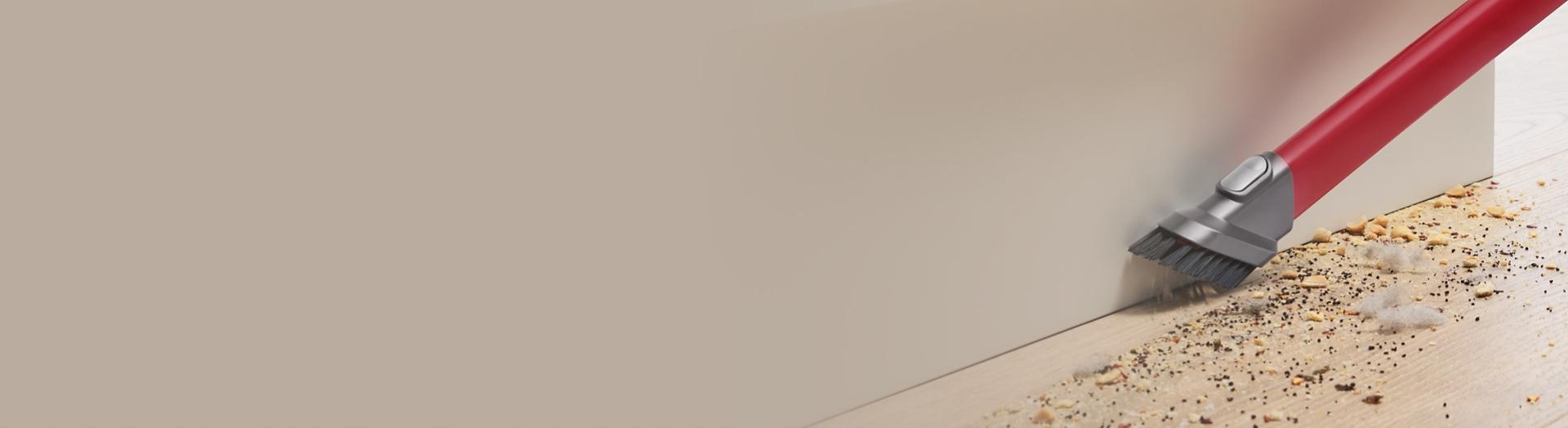 Awkward gap tool removing debris from a tight gap.