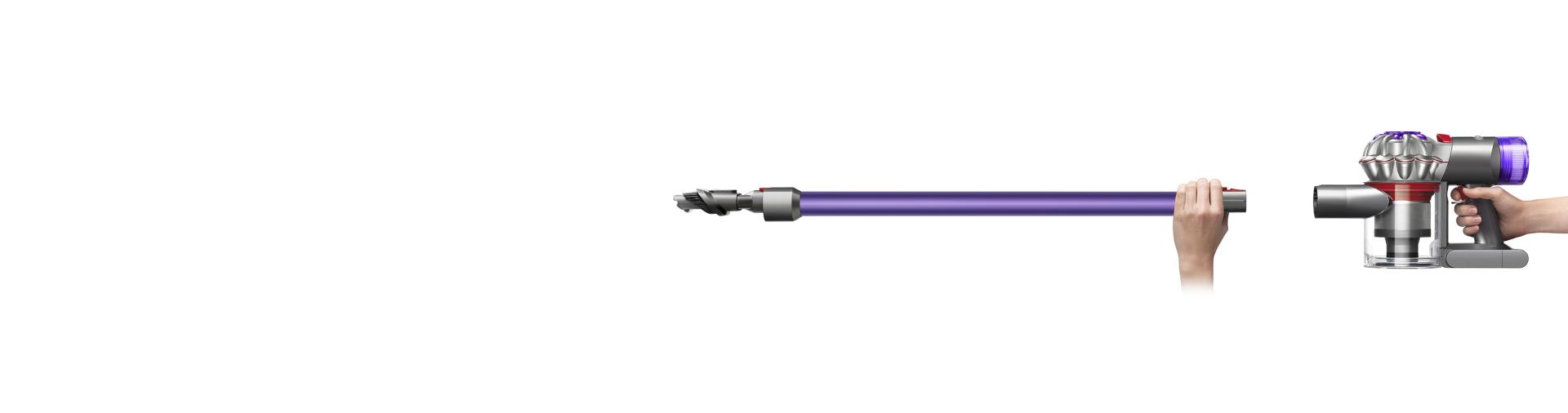 Side view of a hand holding the body of the Dyson V8 vacuum.