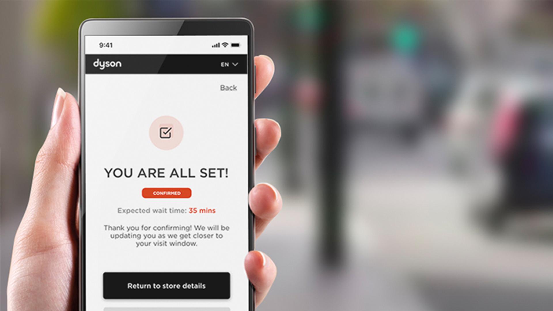 Close-up of hand holding a phone