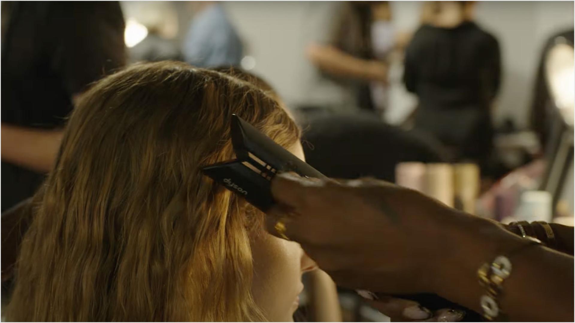 Mustafa speaking to Dyson backstage at last season's Fashion Week, revealing how he creates hair looks for Philip Lim