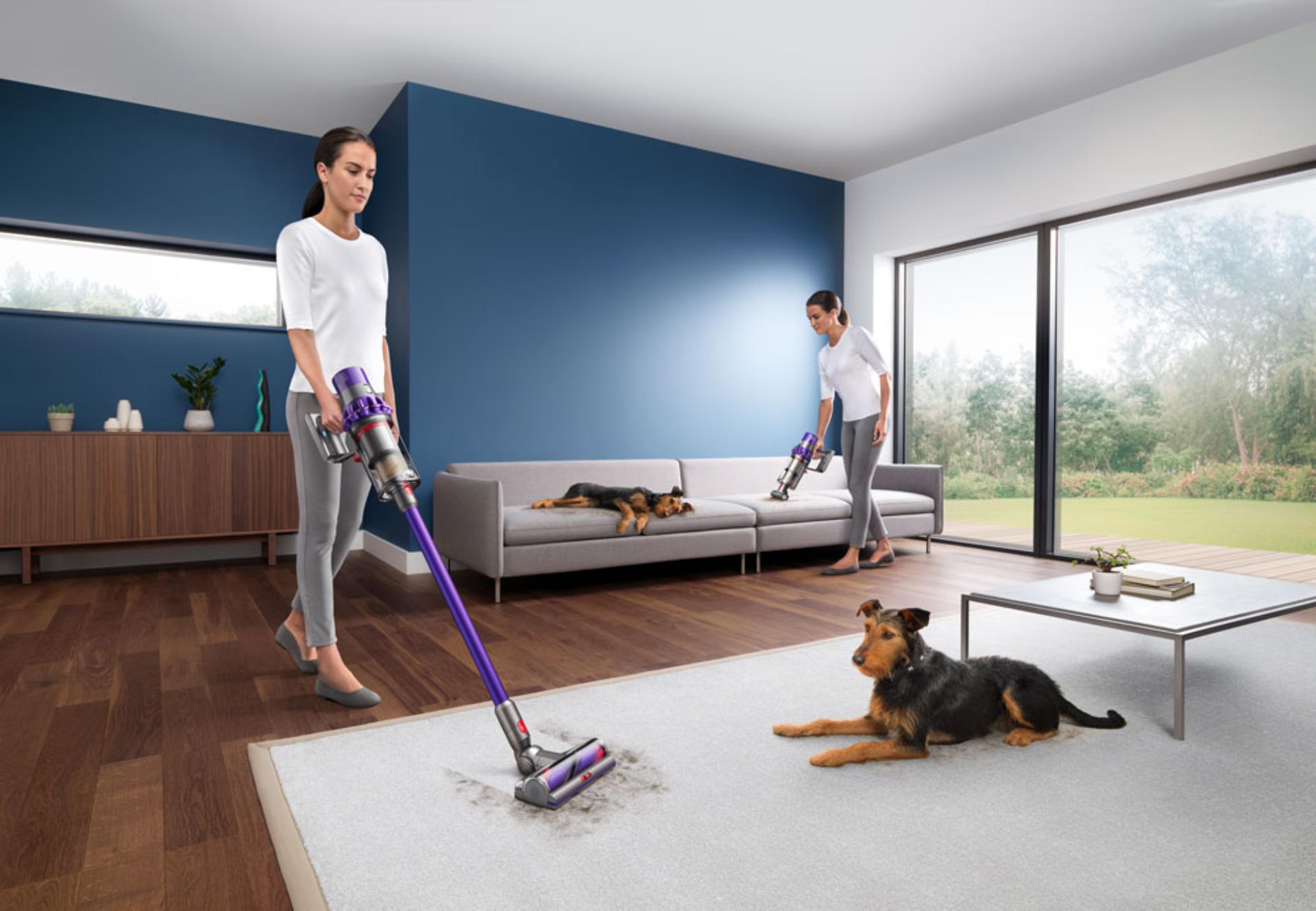 Woman using Dyson Cyclone V10 vacuum cleaner to clean a variety of areas around the home. 