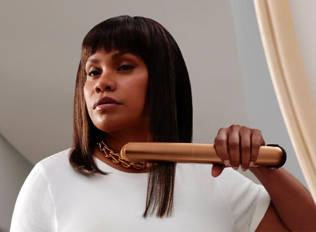 Model using Dyson Corrale straightener