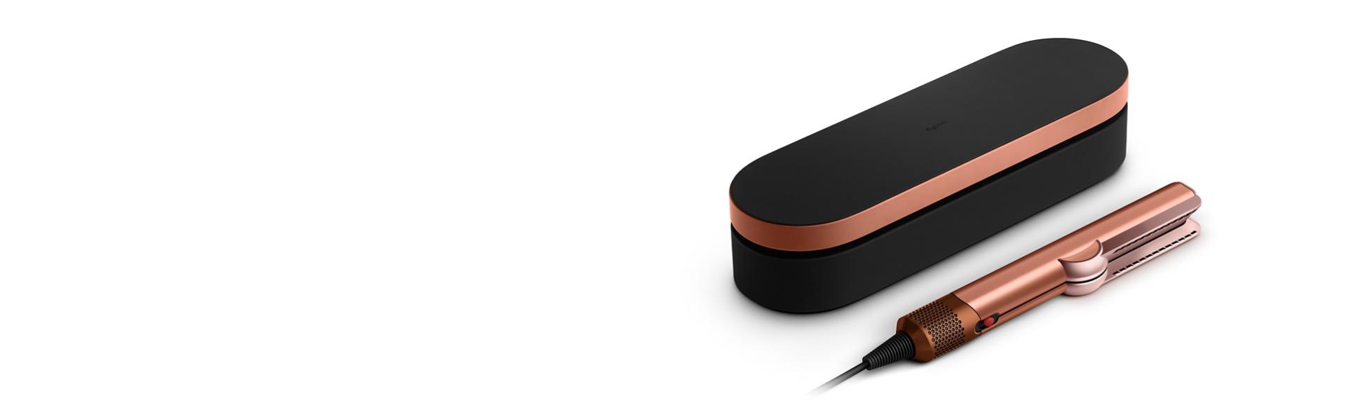 The Dyson Airstrait dryer and straightener with included complimentary gifts.