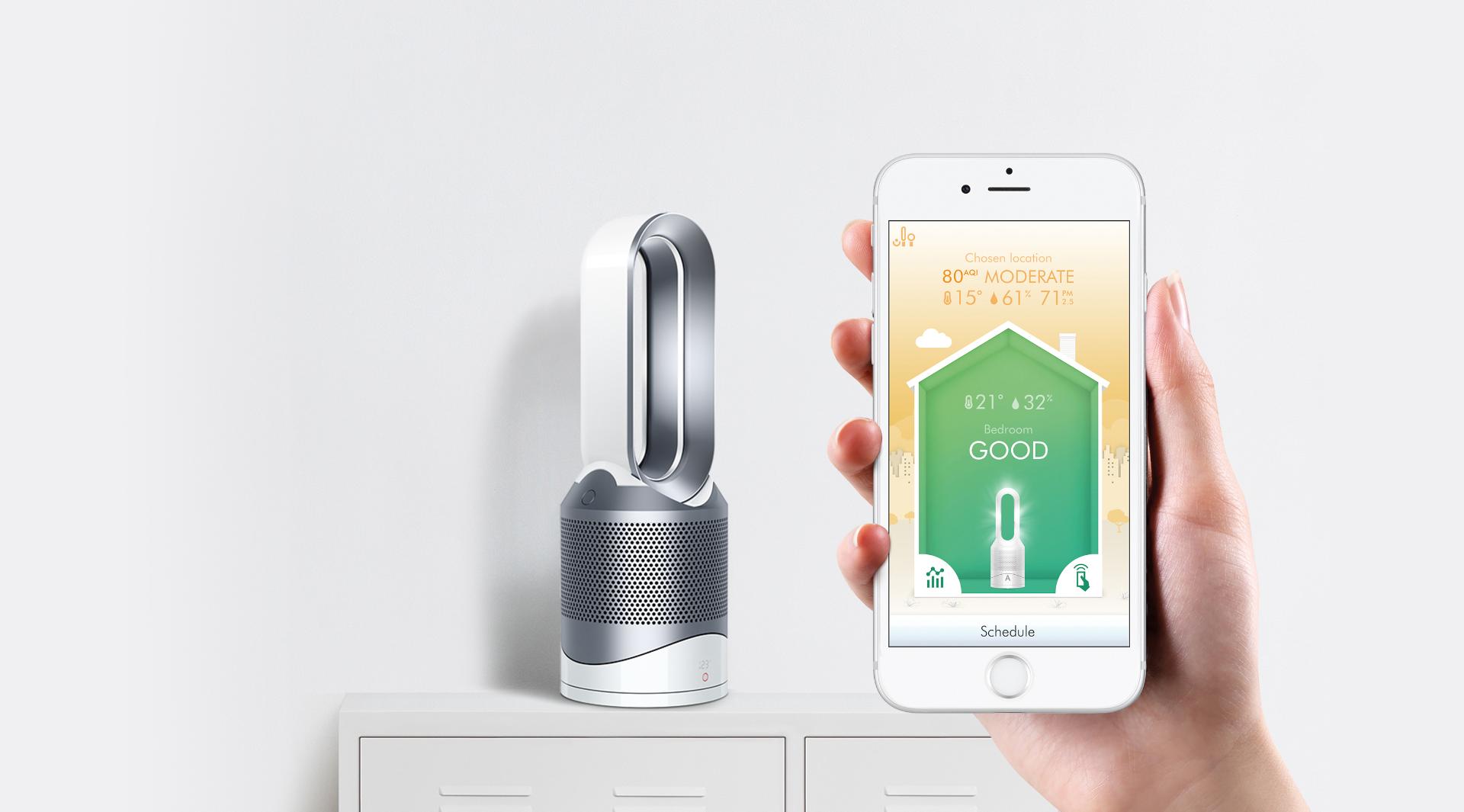 Man with smartphone and Dyson purifier