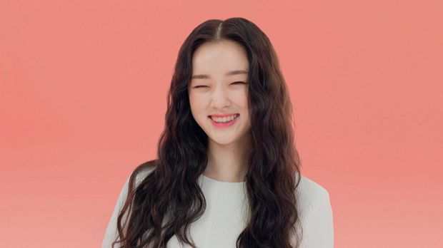 Model wearing a textured beach wave style