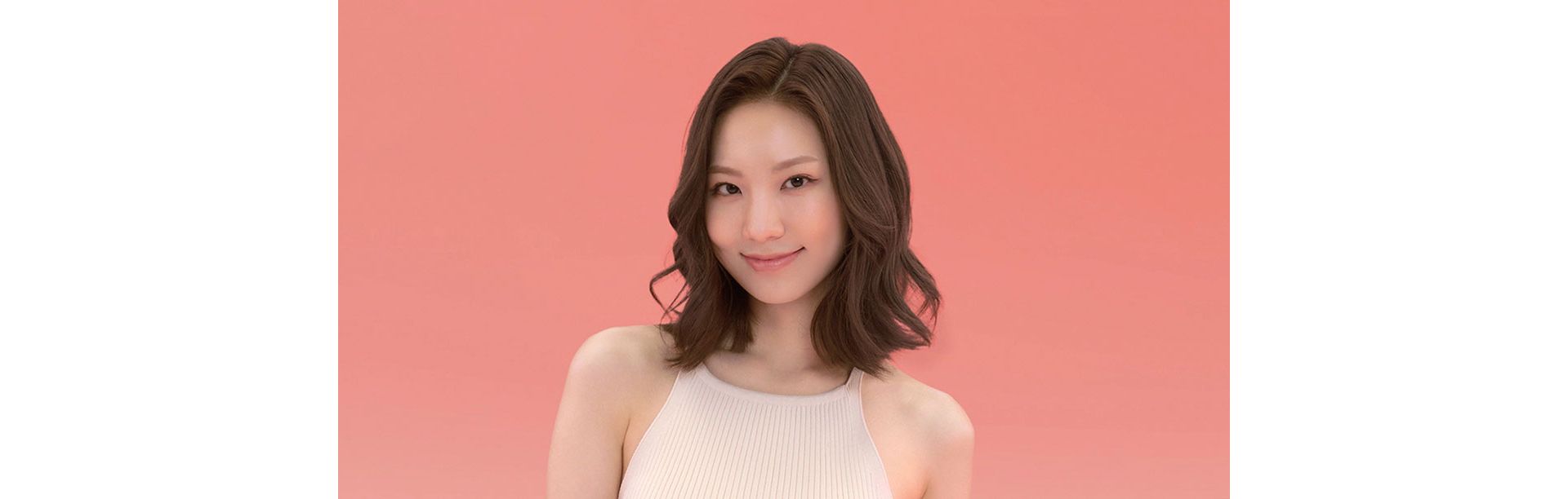 Model wearing a smooth, sleek style