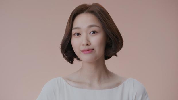 Model wearing short waves style