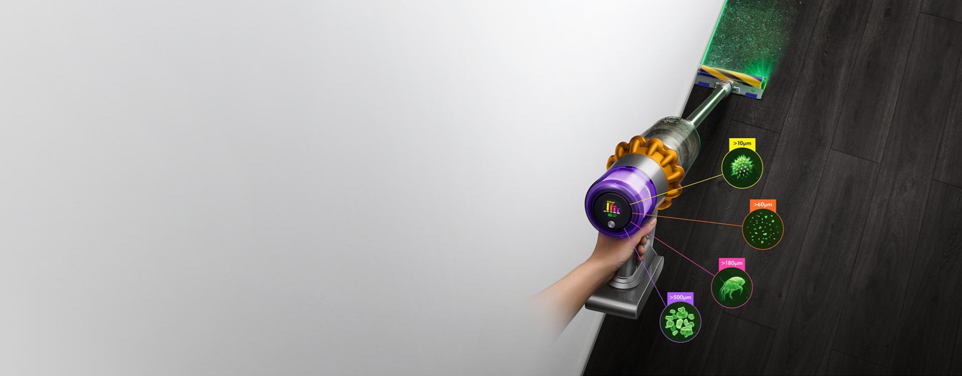 Dyson V15 Detect vacuum with Laser Slim Fluffy cleaner head, showing sizes of dust detected