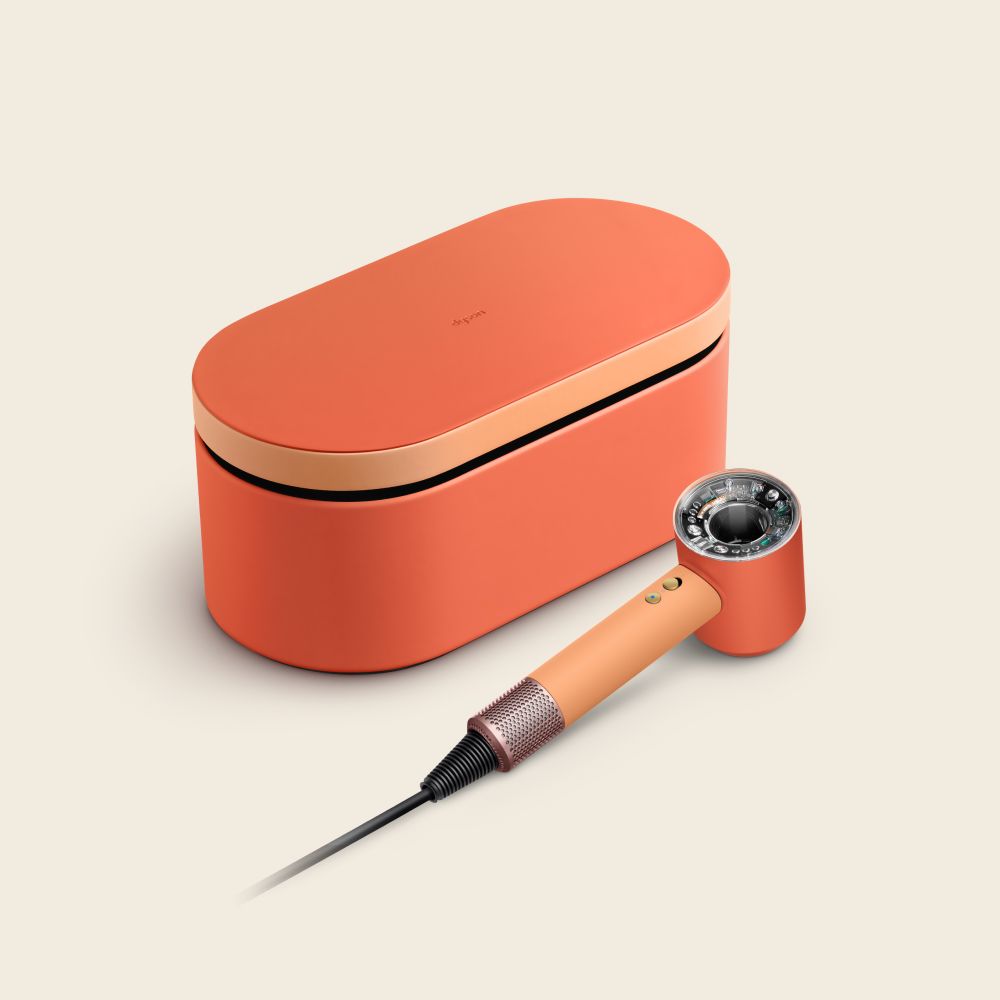 The Dyson Supersonic Nural hair dryer with a range of attachments.