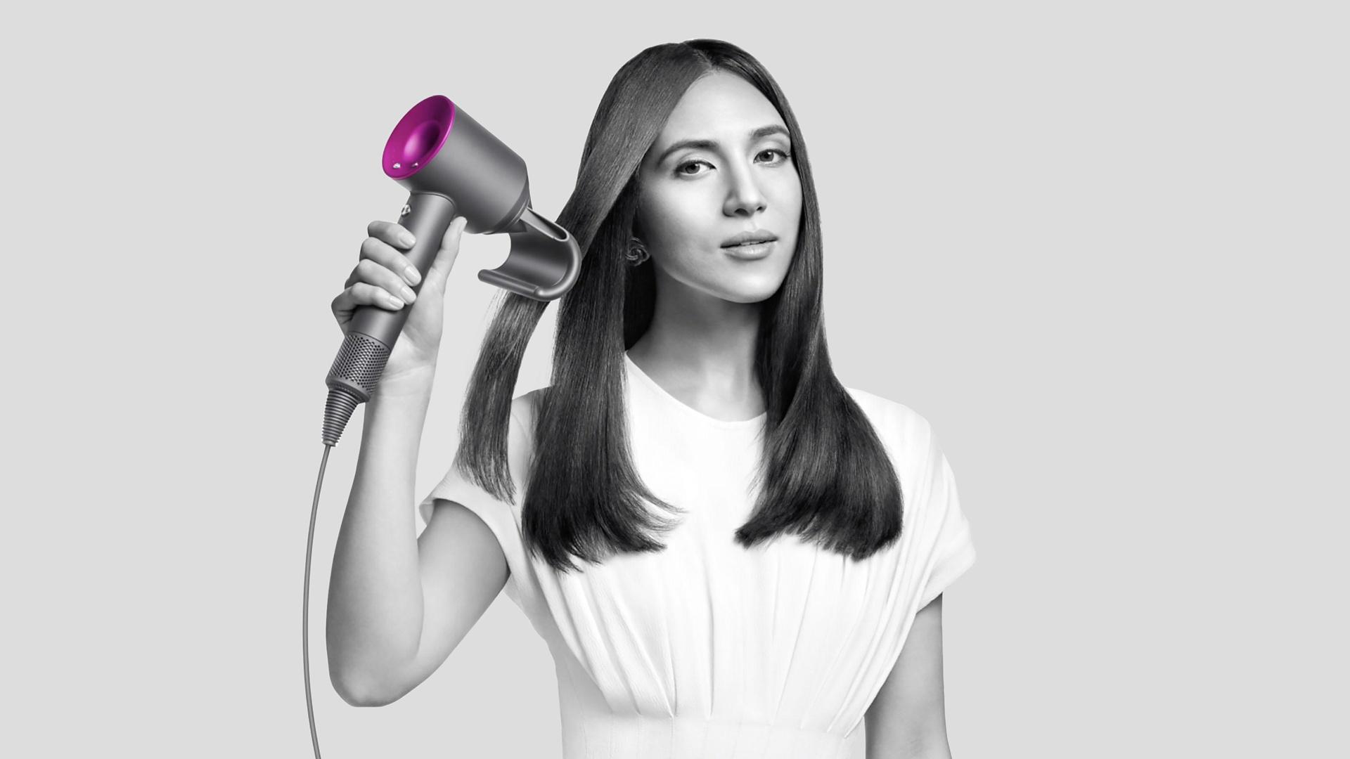 A model using the Dyson Supersonic hair dryerA model using the Dyson Supersonic hair dryer