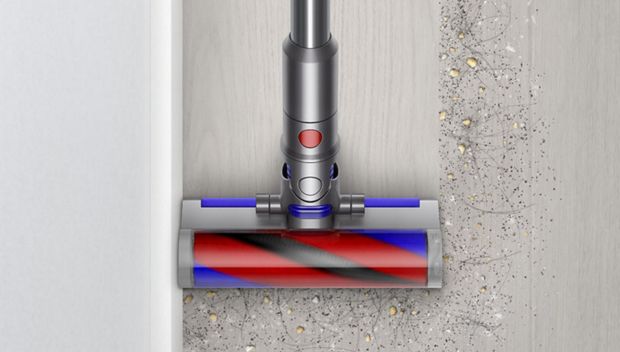 Dyson Micro 1.5kg cleaner head cleaning next to a wall