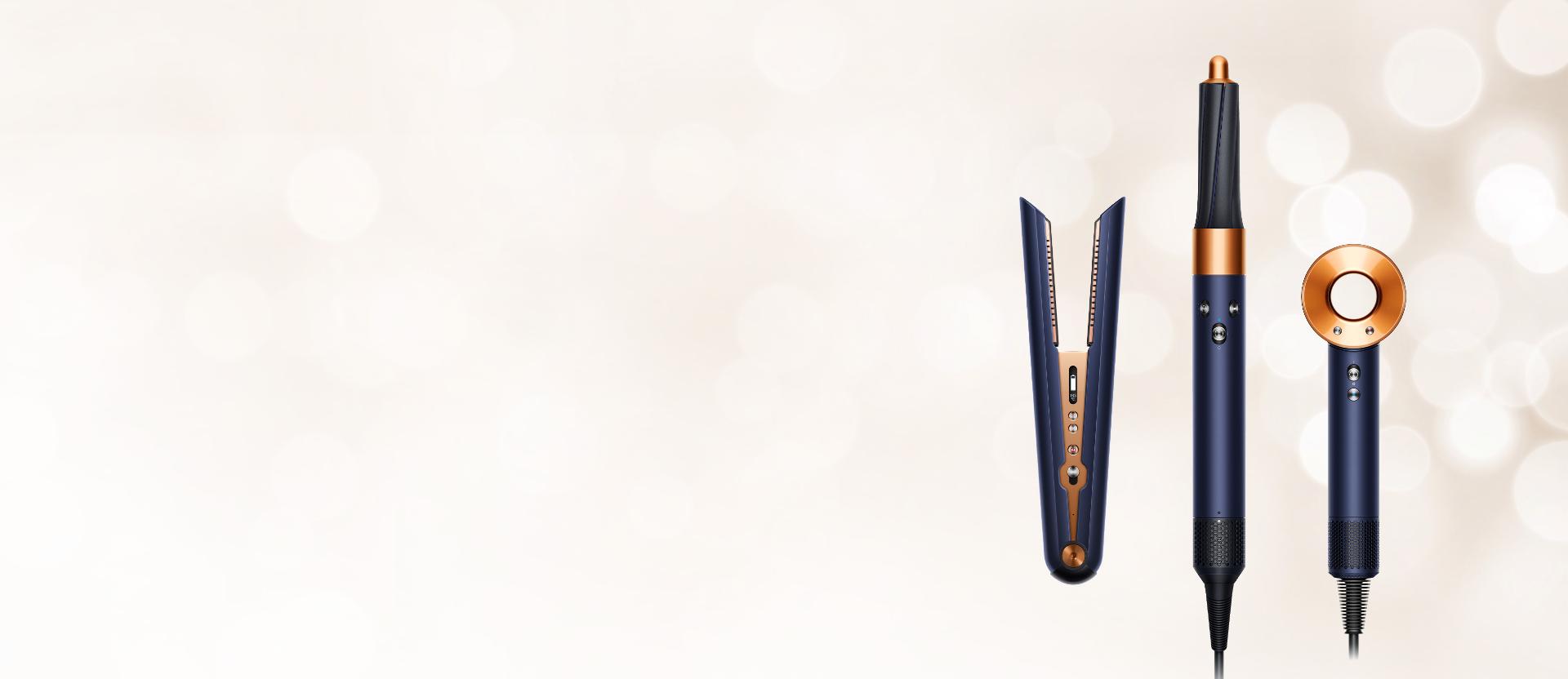 Dyson Airwrap styler and Supersonic hair dryer in Prussian blue and rich copper