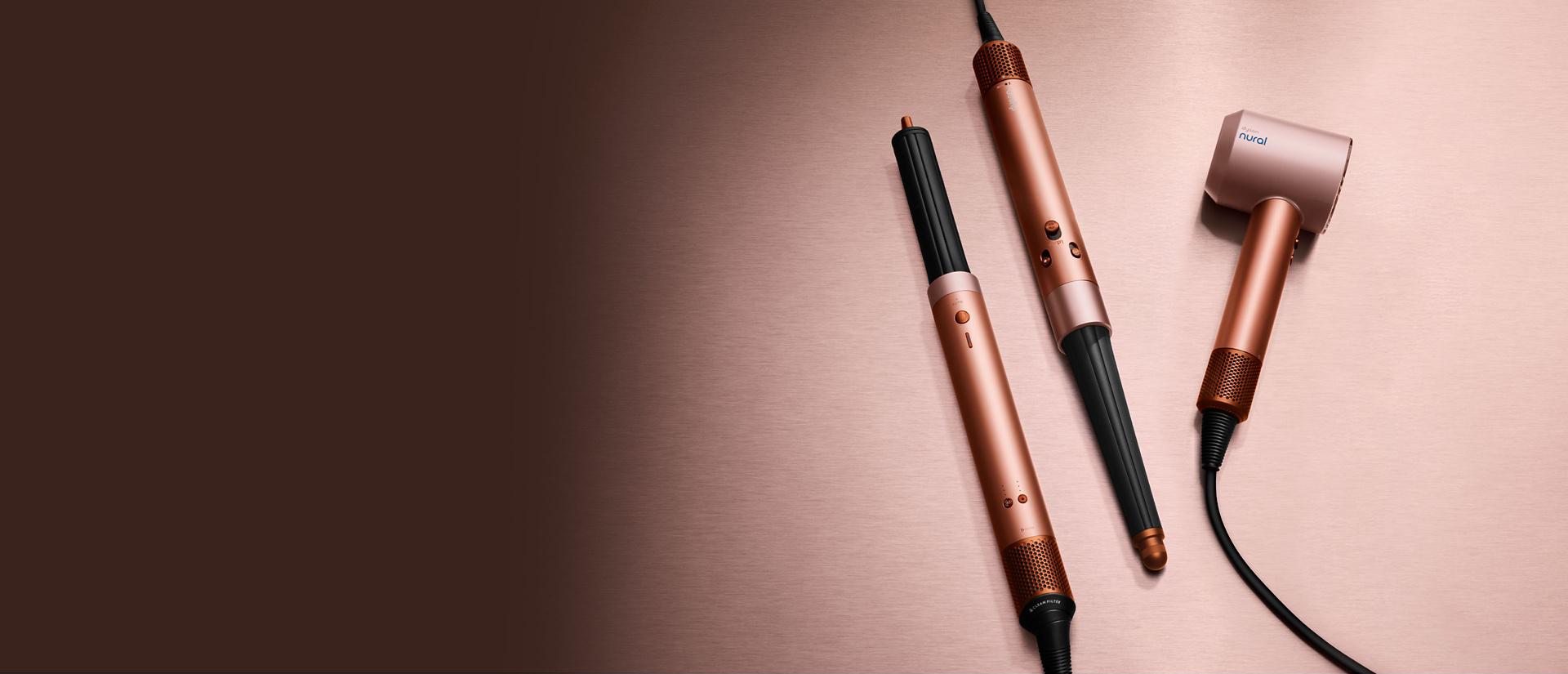 The Dyson Beauty device range in Amber silk colourway.