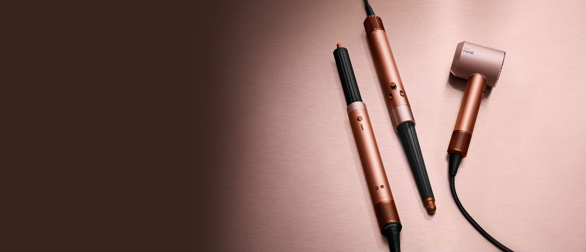 The Dyson Beauty device range in Amber silk colourway.