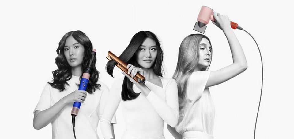 Prostownico-lokówka Dyson Corrale, multistyler Dyson Airwrap oraz suszarka do włosów Dyson Supersonic w różnych wersjach kolorystycznych.