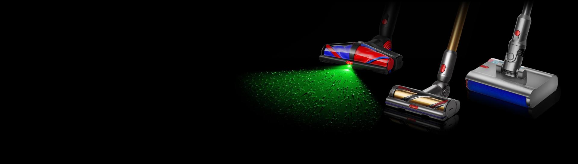 The Dyson Piston Animal cordless vacuum beside two other Dyson vacuums.