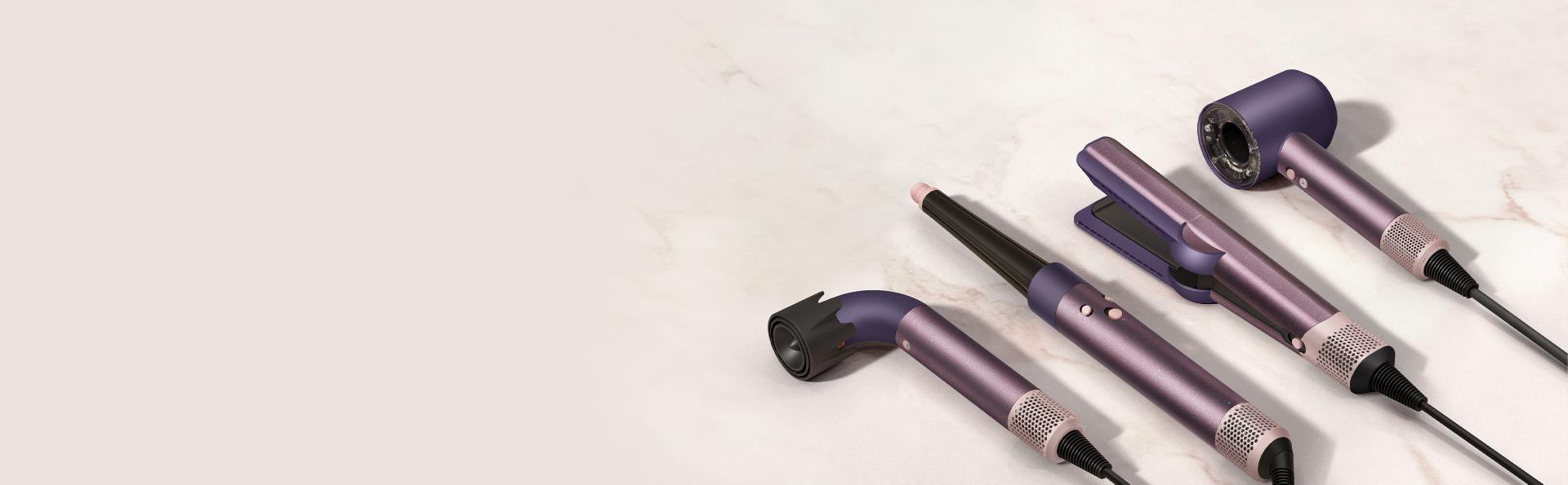 The Dyson Beauty device range in Jasper plum.