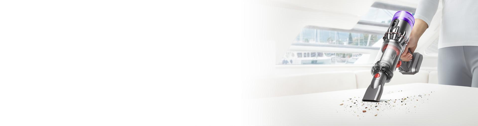 Dyson Micro 1.5kg with worktop tool cleaning a counter