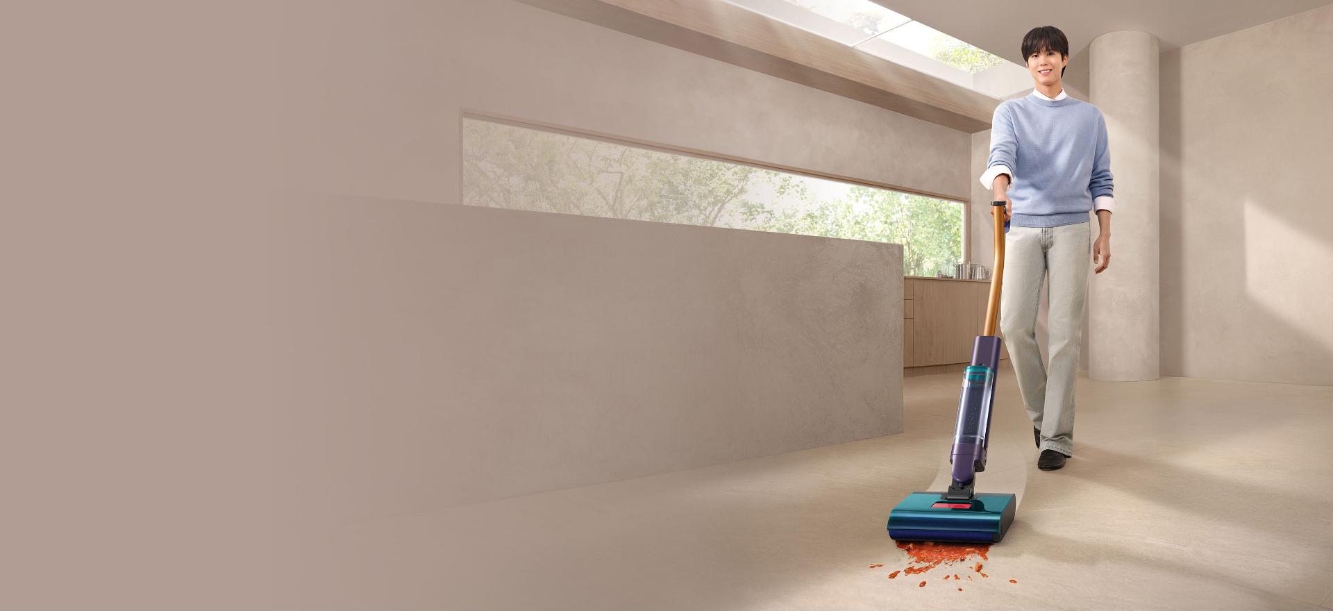 The Dyson Clean+Wash Hygiene hard floor cleaner washing a floor.