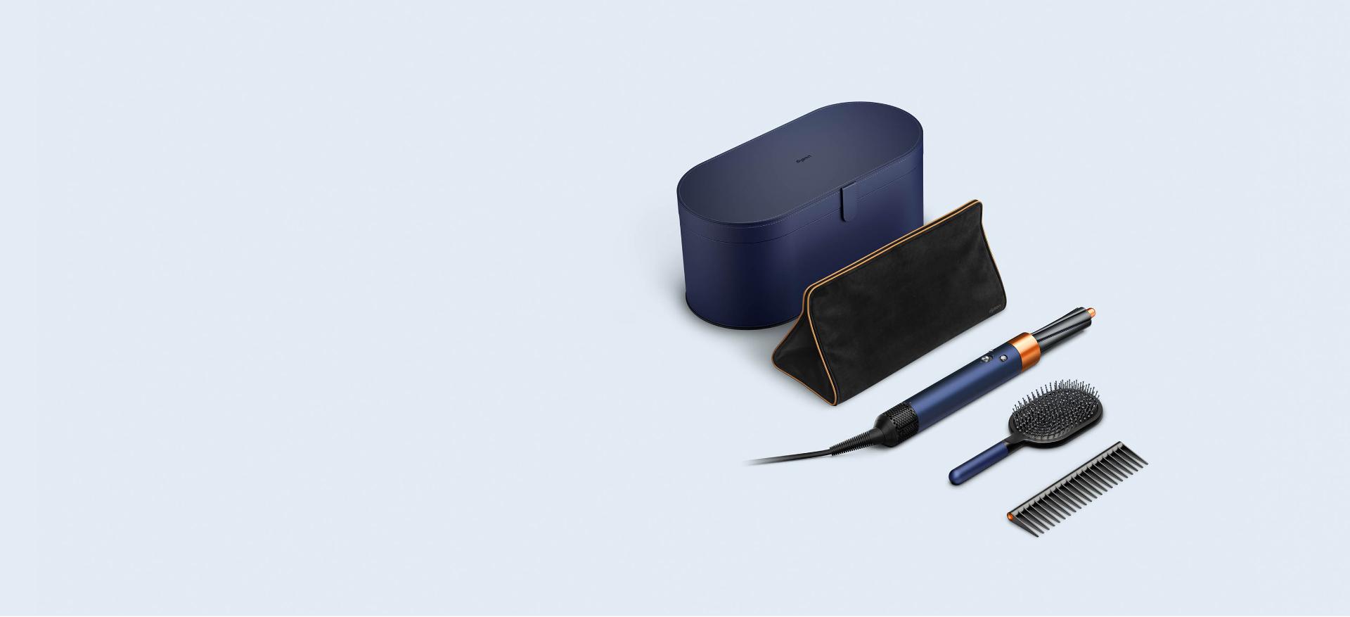 Dyson Airwrap styler and Supersonic hair dryer in Prussian blue and rich copper