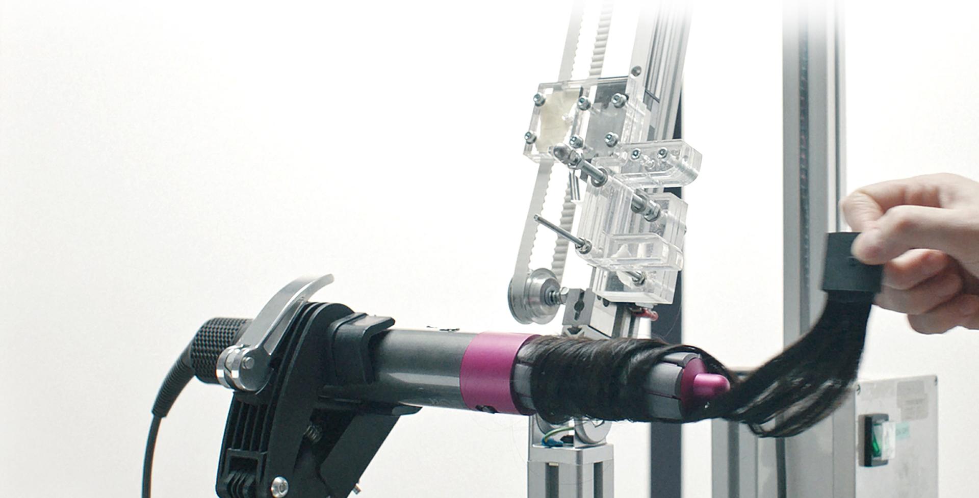 Video demonstration of science behind the Dyson Airwrap™ hair styler