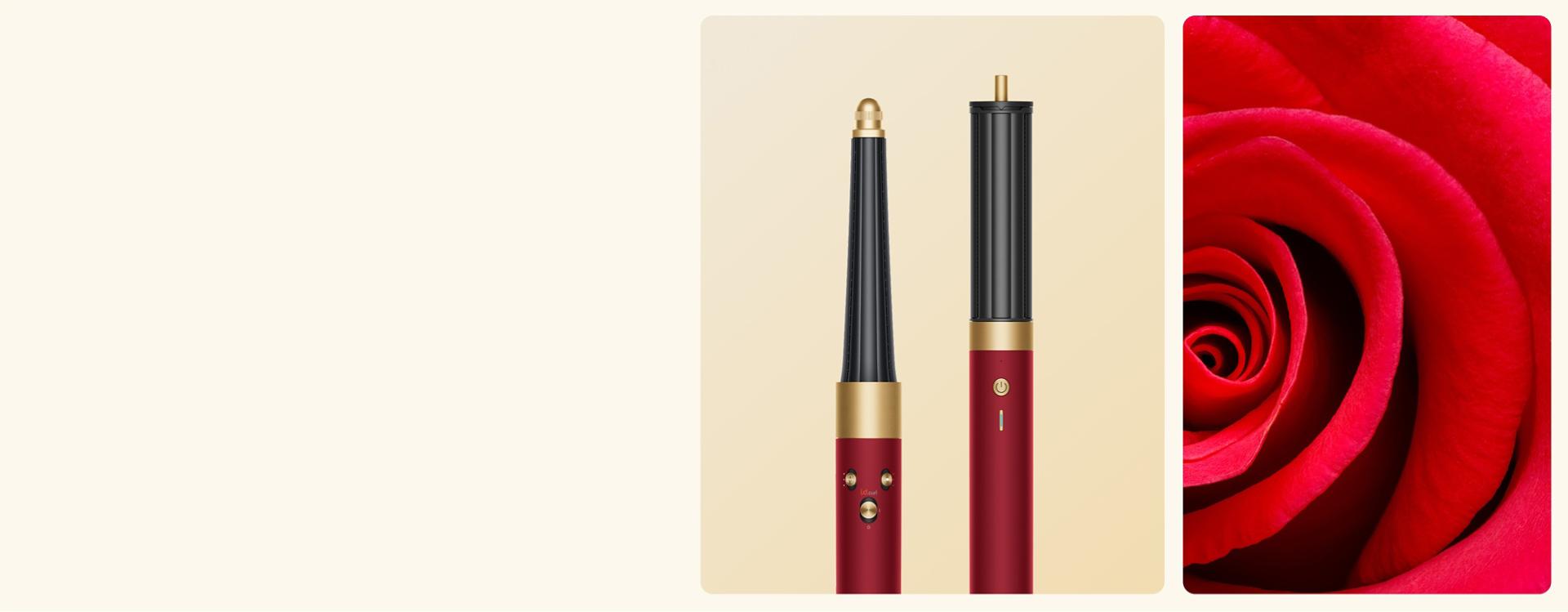 A blooming rose next to the Dyson Airwrap i.d. multi-styler and dryer in Red velvet and gold, and storage case.