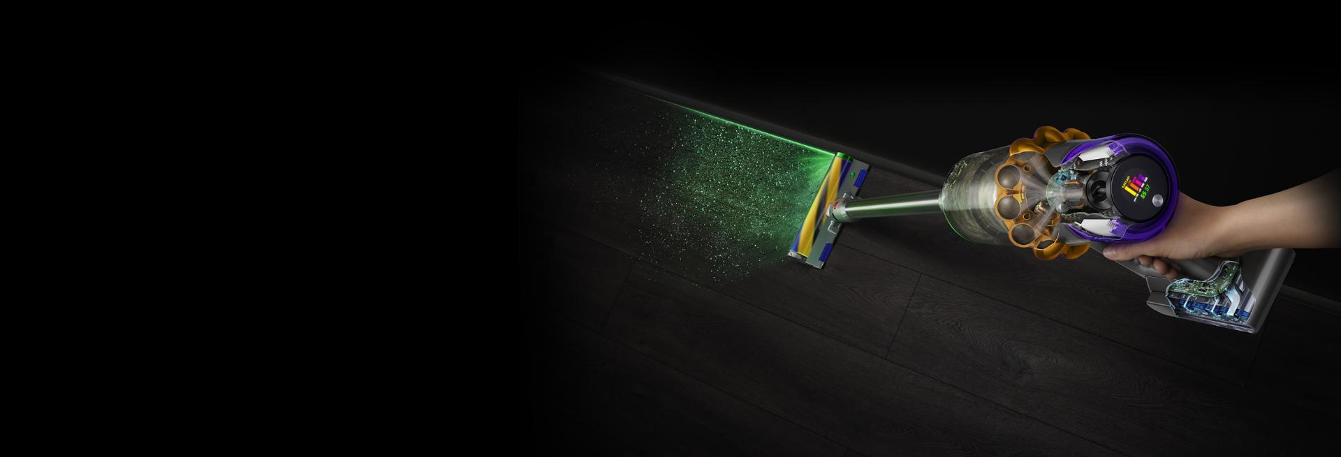 Dyson V15 Detect vacuum with Laser Slim Fluffy cleaner head, showing sizes of dust detected
