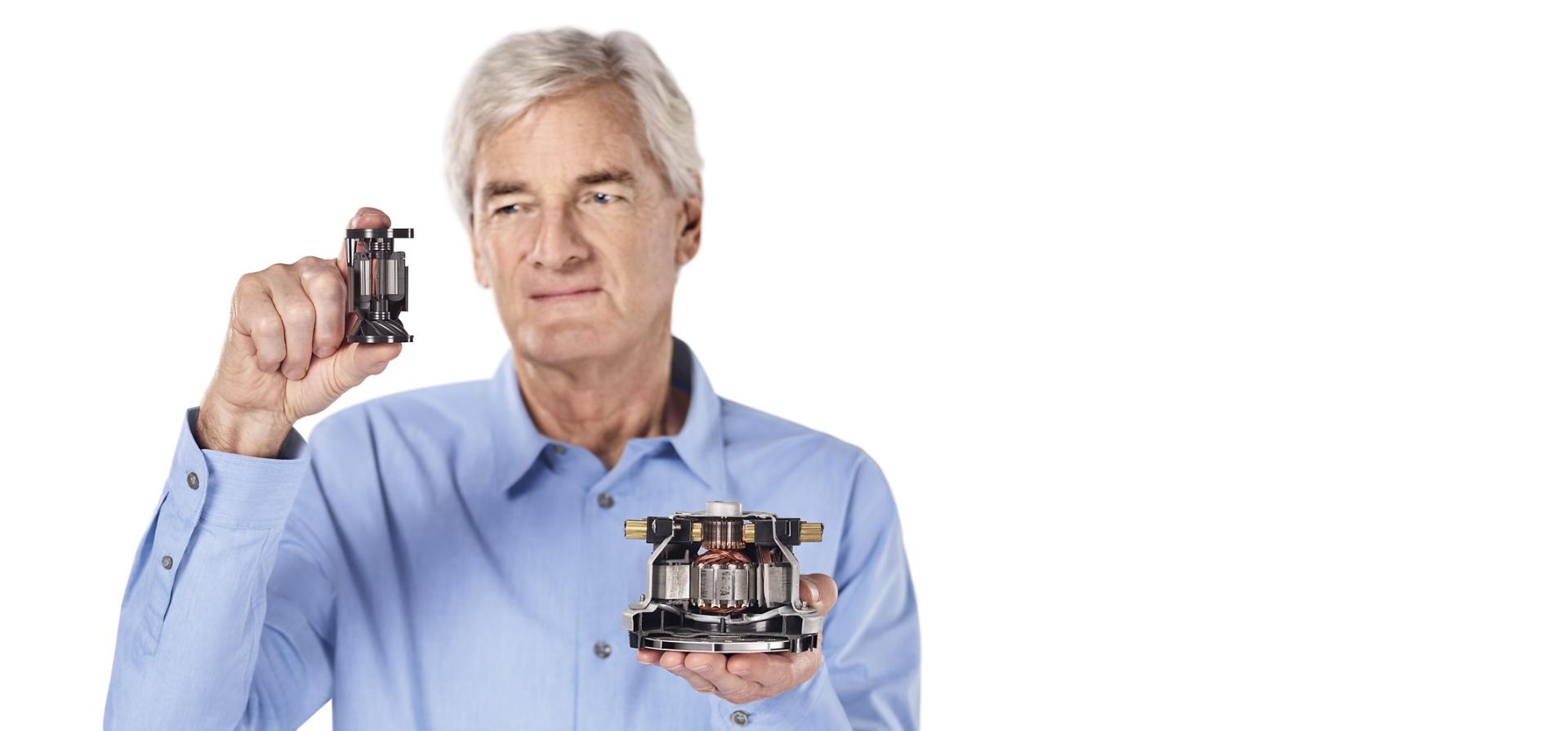 James Dyson holding Dyson digital motor V10