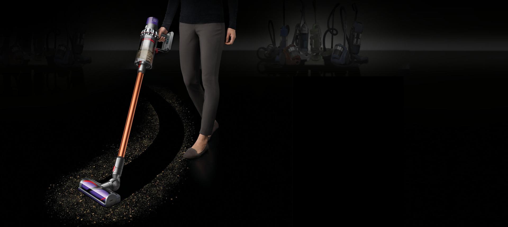 Dyson Cyclone V10™ vacuum cleaner on black floor