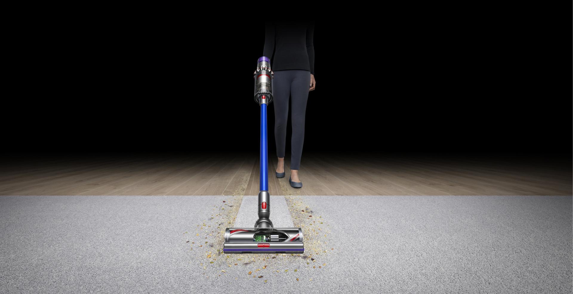Front view of Dyson V11™ vacuum on carpet