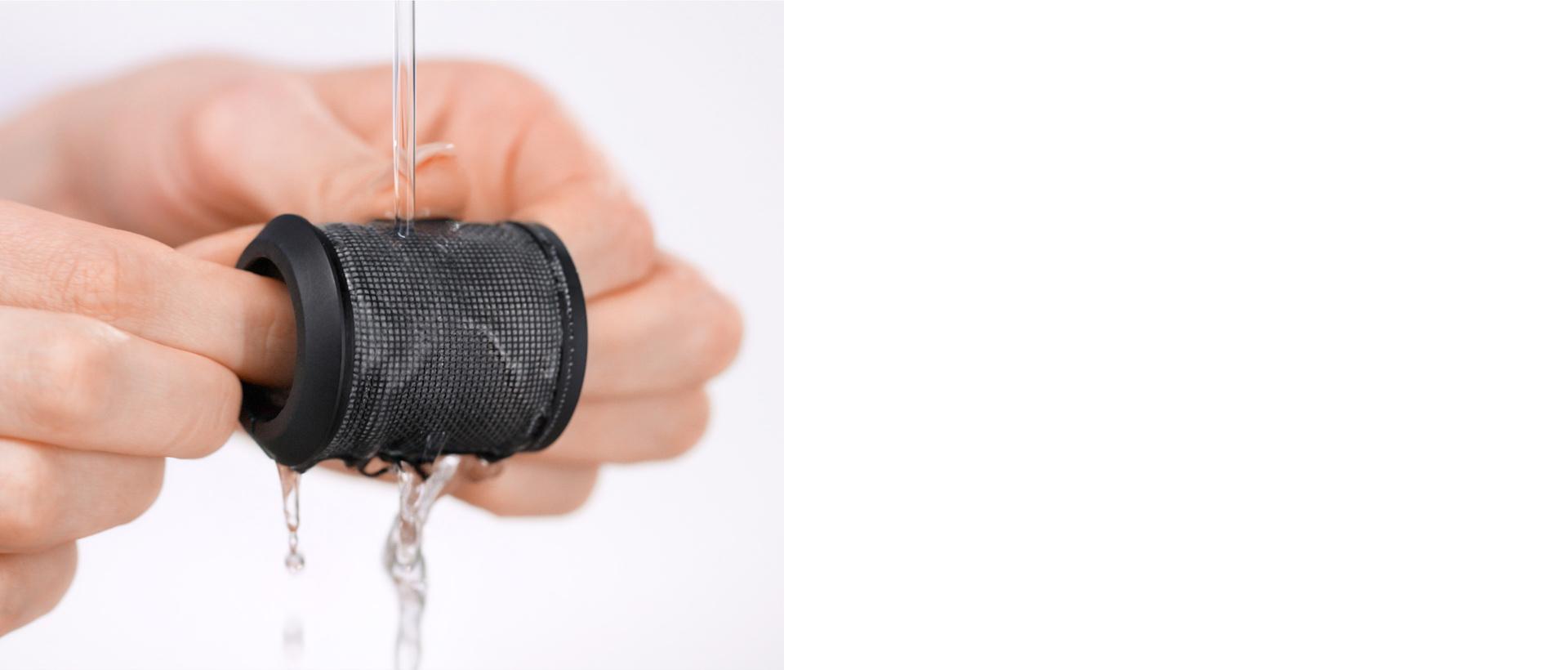 Owner rinsing the internal filter.