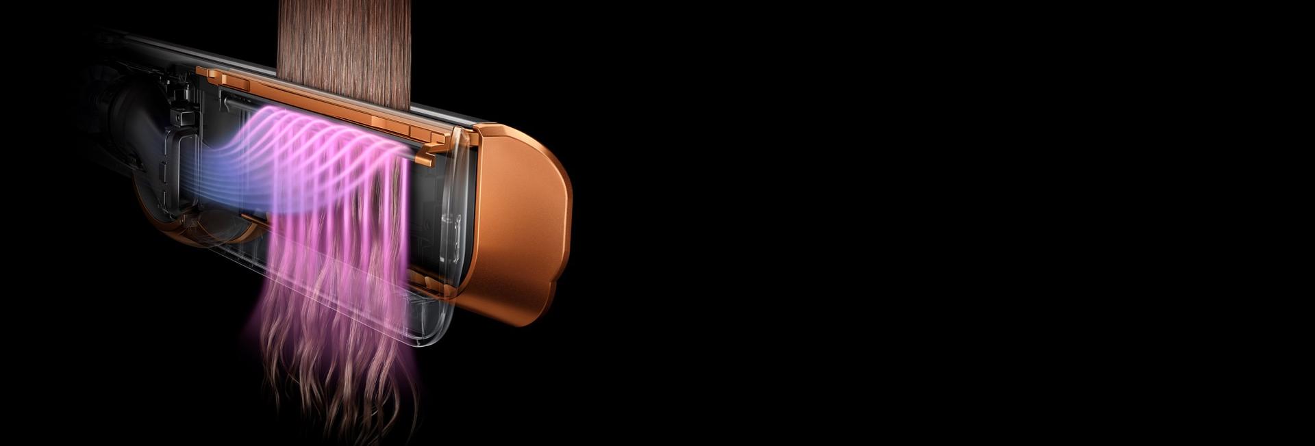 Cutaway graphic showing how air is shaped by the Dyson Airstrait to straighten hair without extreme heat.