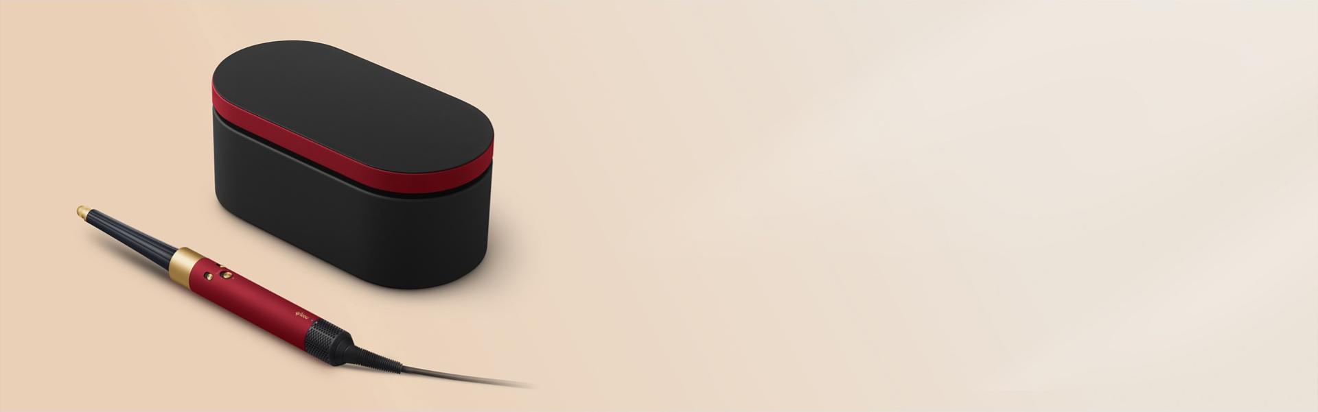 The Dyson Airwrap i.d. multi-styler and dryer with Presentation case in the Red velvet and gold colourway.