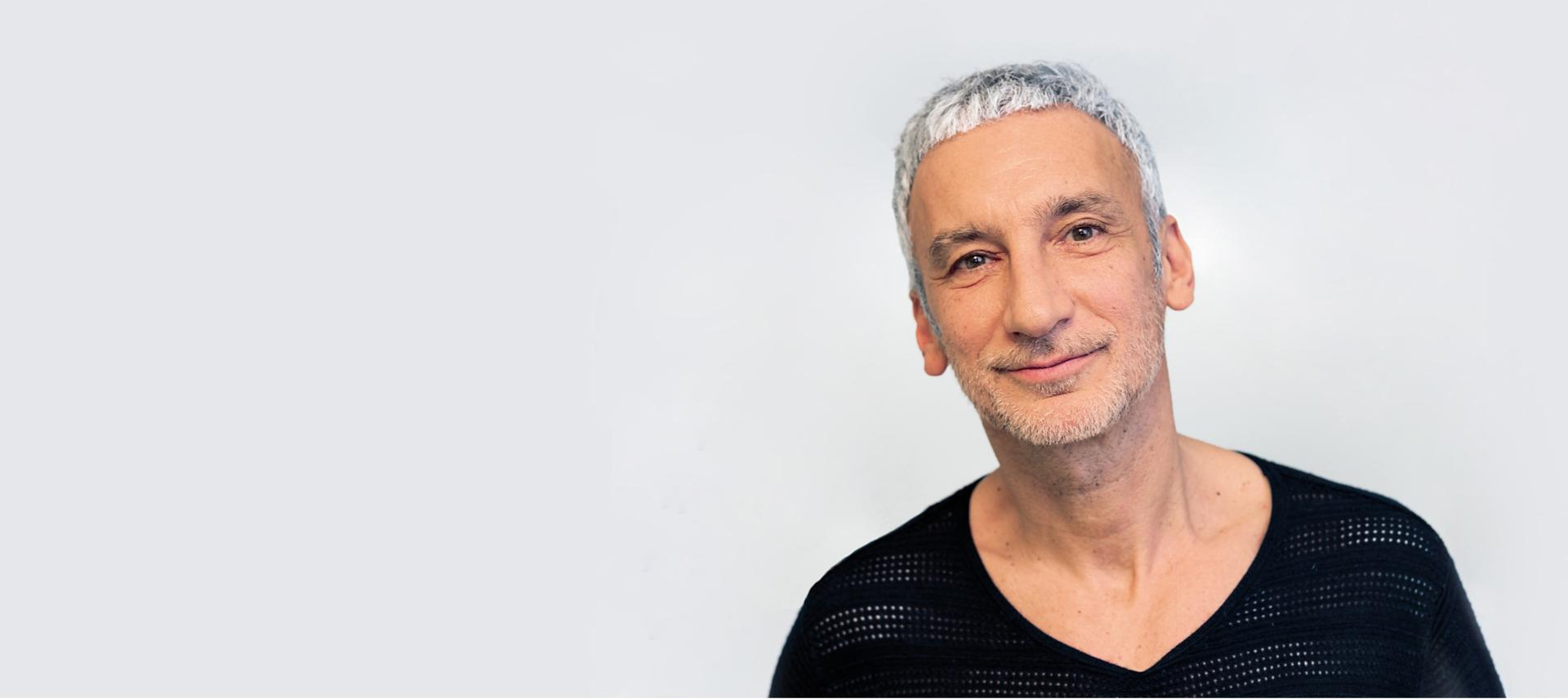 Akin Konizi with Dyson engineers and scientists