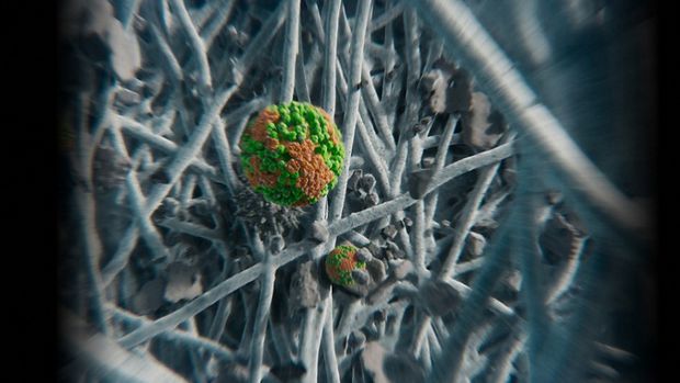 Extreme close up of filter media trapping microscopic pollutants.