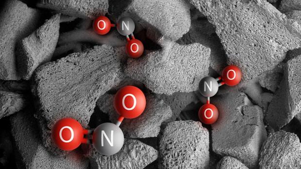 Particles with letters n and o close-up.