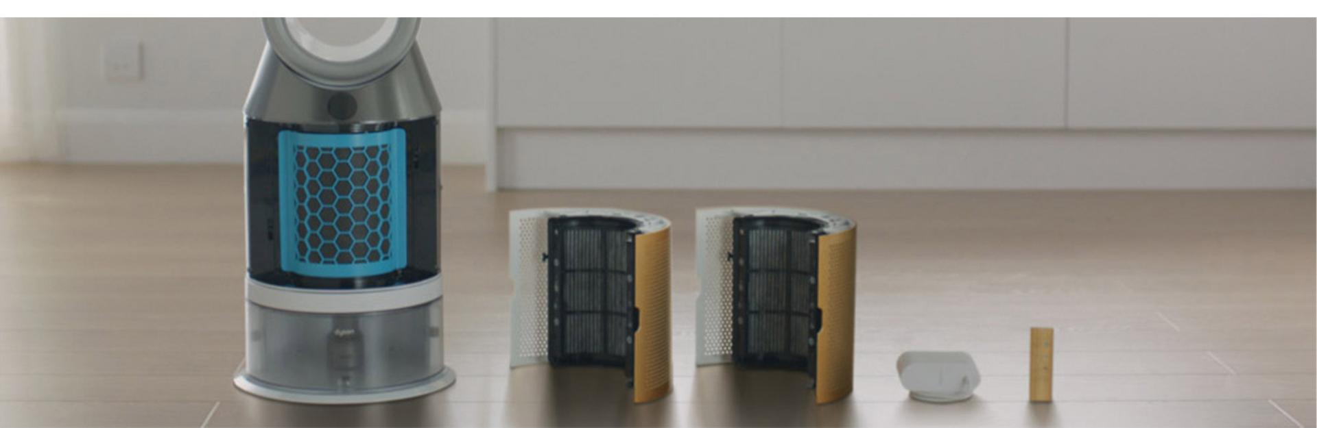 A purifier humidifier with the filters and remote alongside