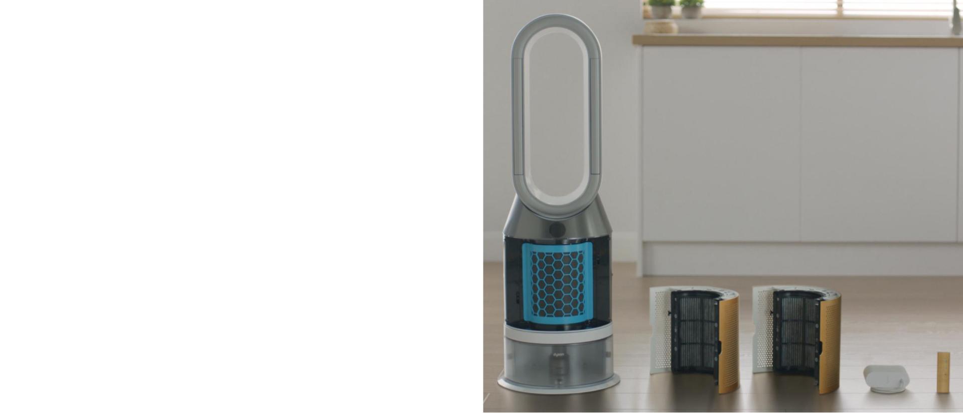 A purifier humidifier with the filters and remote alongside.