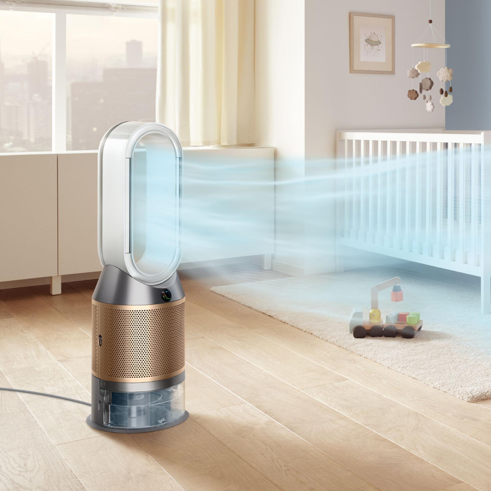 A purifier humidifier projecting hydrated air in a bedroom