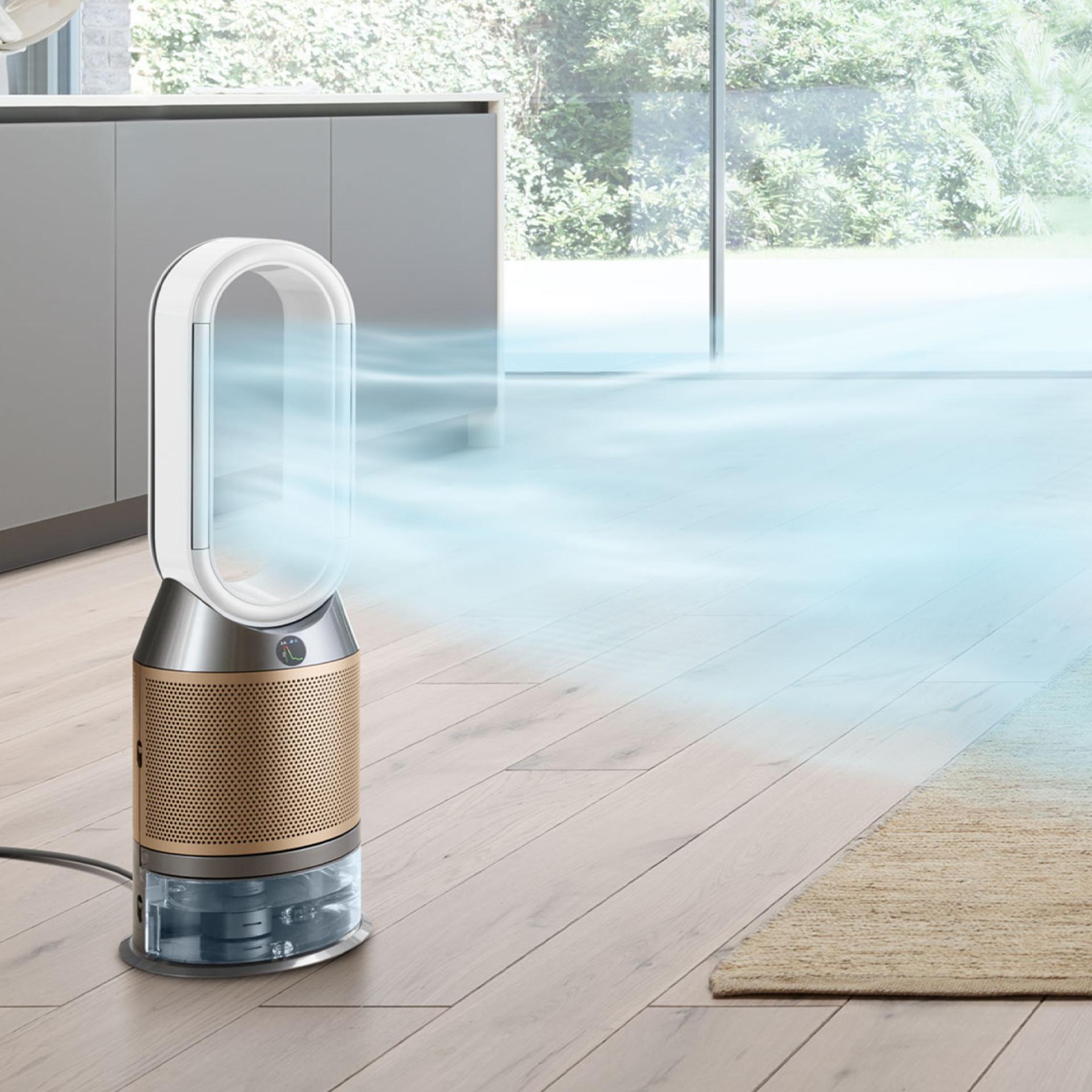 A purifier humidifier projecting hydrated air in a living space