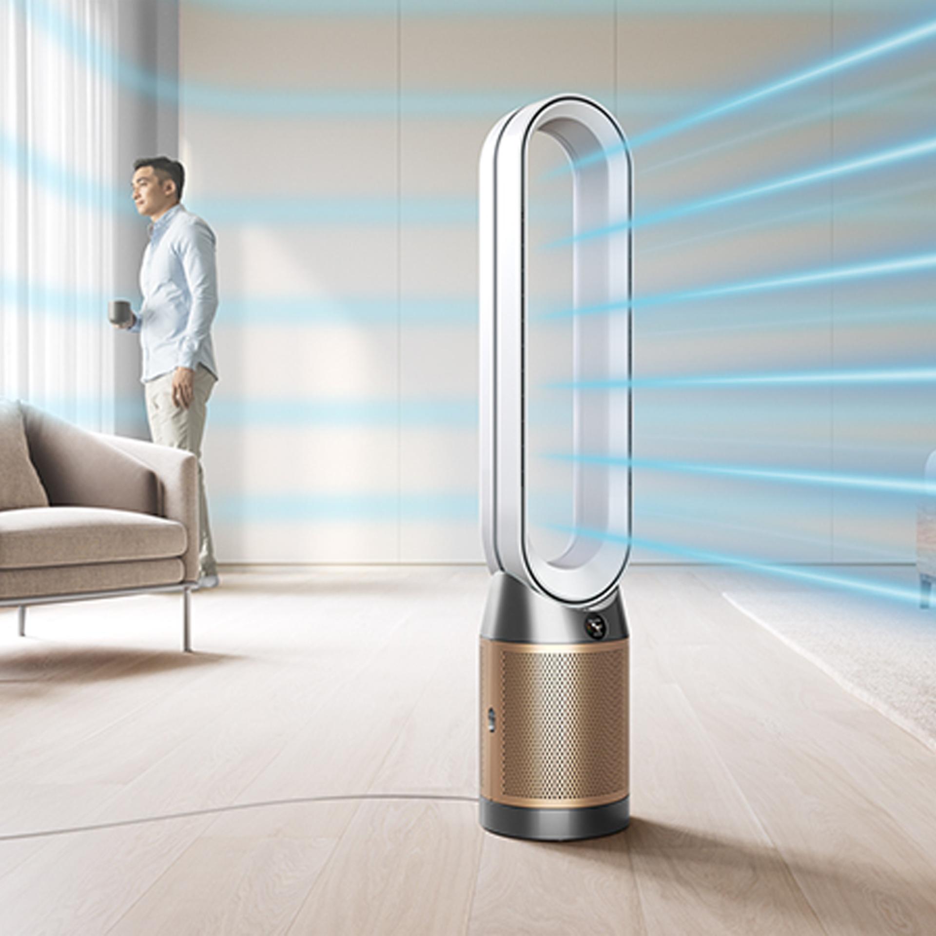 A Dyson purifier in a living space with blue lines to represent airflow