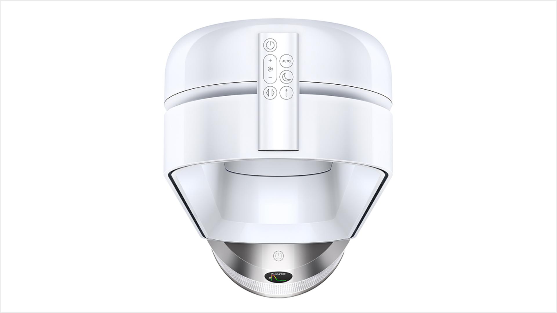 The remote control stored on the top of a Dyson purifier.