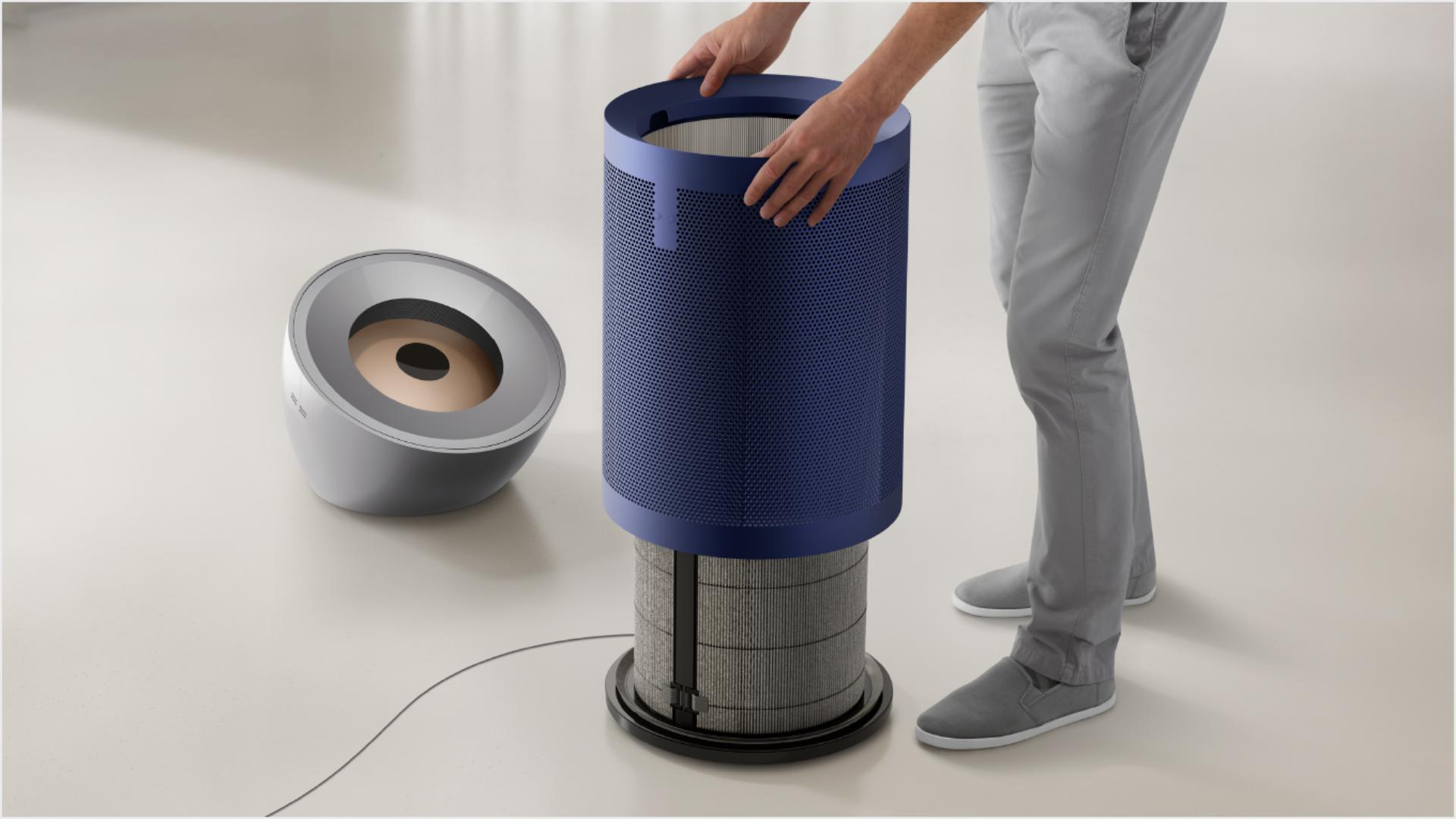 A person opening the Dyson Purifier Big+Quiet Formaldehyde to access the filter.
