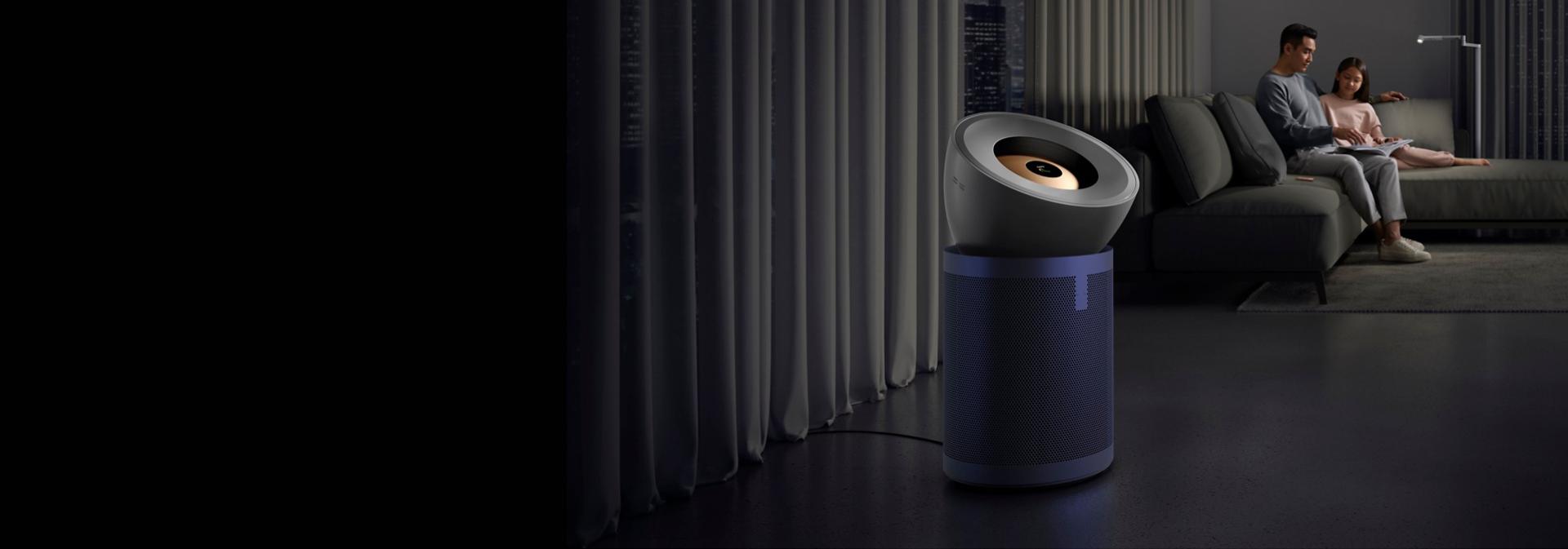 The Dyson Purifier Big+Quiet Formaldehyde and Dyson Vis Nav robot in a modern home with a spiral staircase.