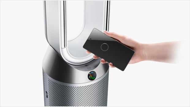 Mobile device being held close to the machine