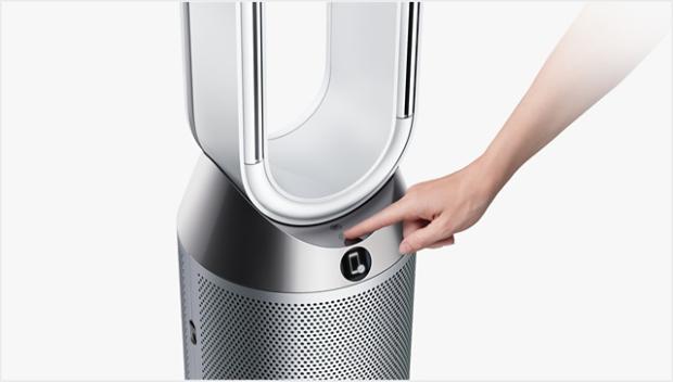 Standby button being pressed on the machine