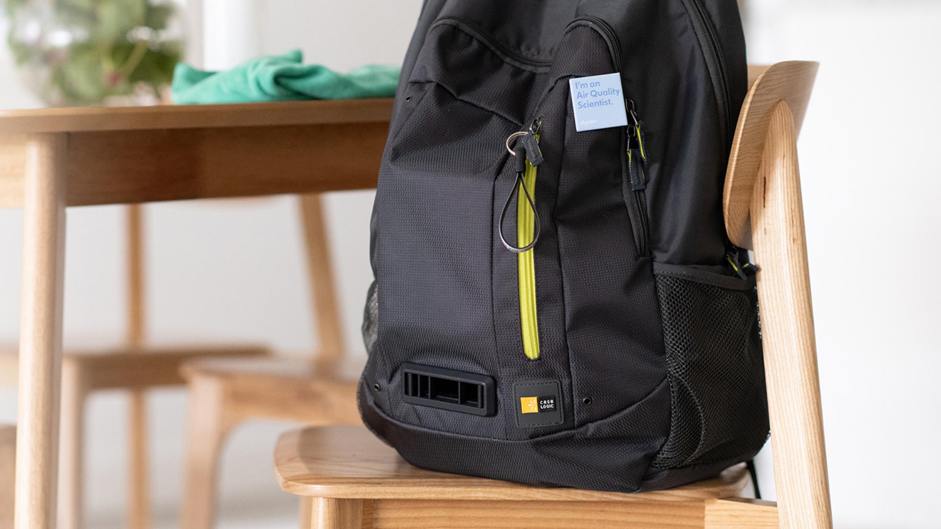 A backpack on a kitchen chair
