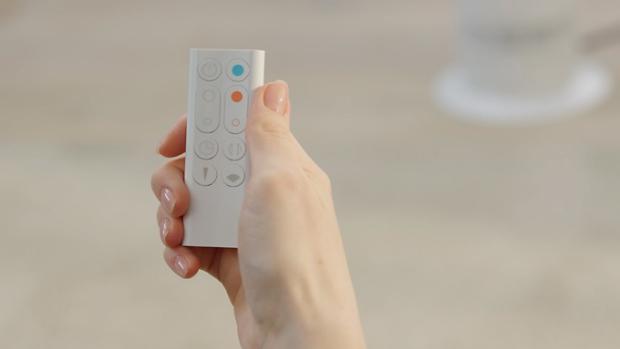 Machine owner pointing their remote control