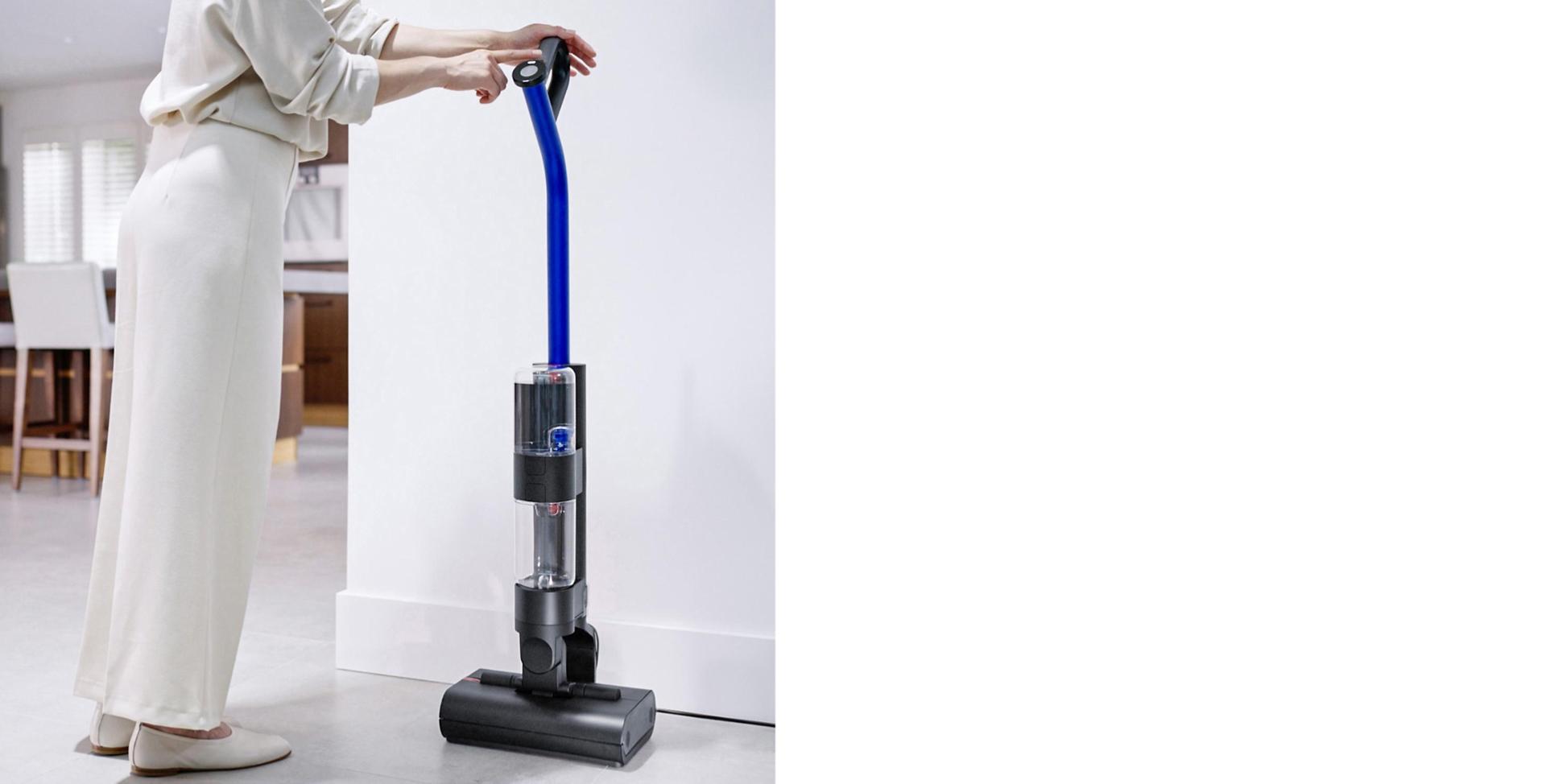 A user selecting the Self clean cycle as the machine sits on the dock.