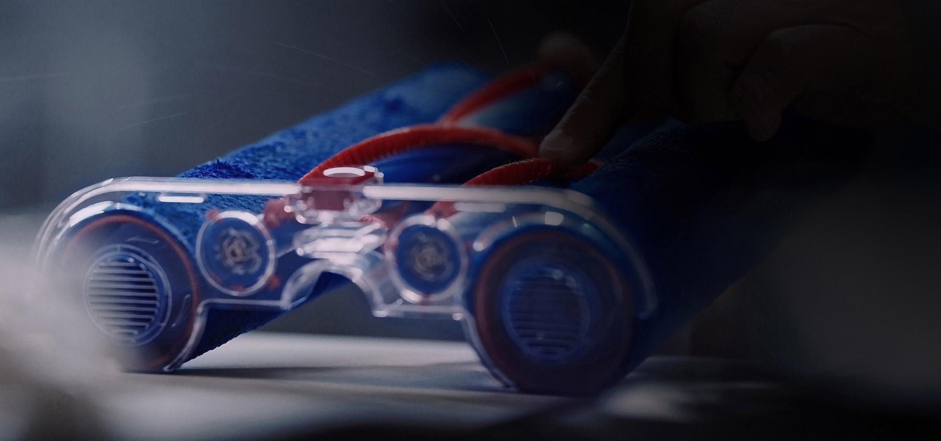 A close-up of a Dyson engineer testing the Dyson WashG1 secondary rollers